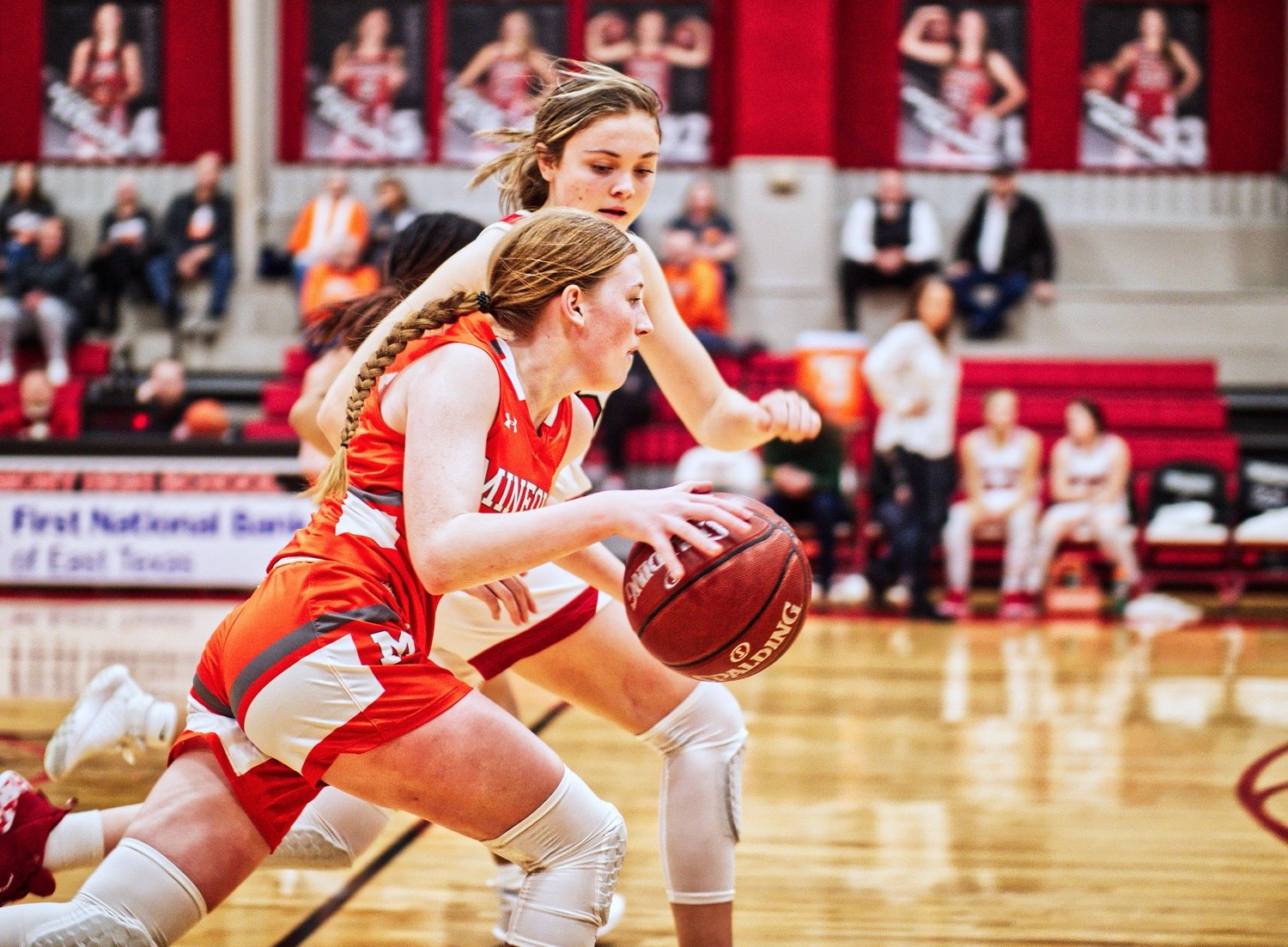 Macy Fischer makes her way up-court, undeterred by the Harmony defender. [more hoops highlights here]